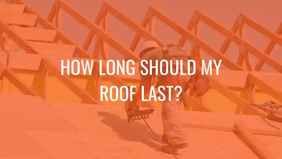 Worker using nail gun on wooden roof frame with text about roof lifespan.