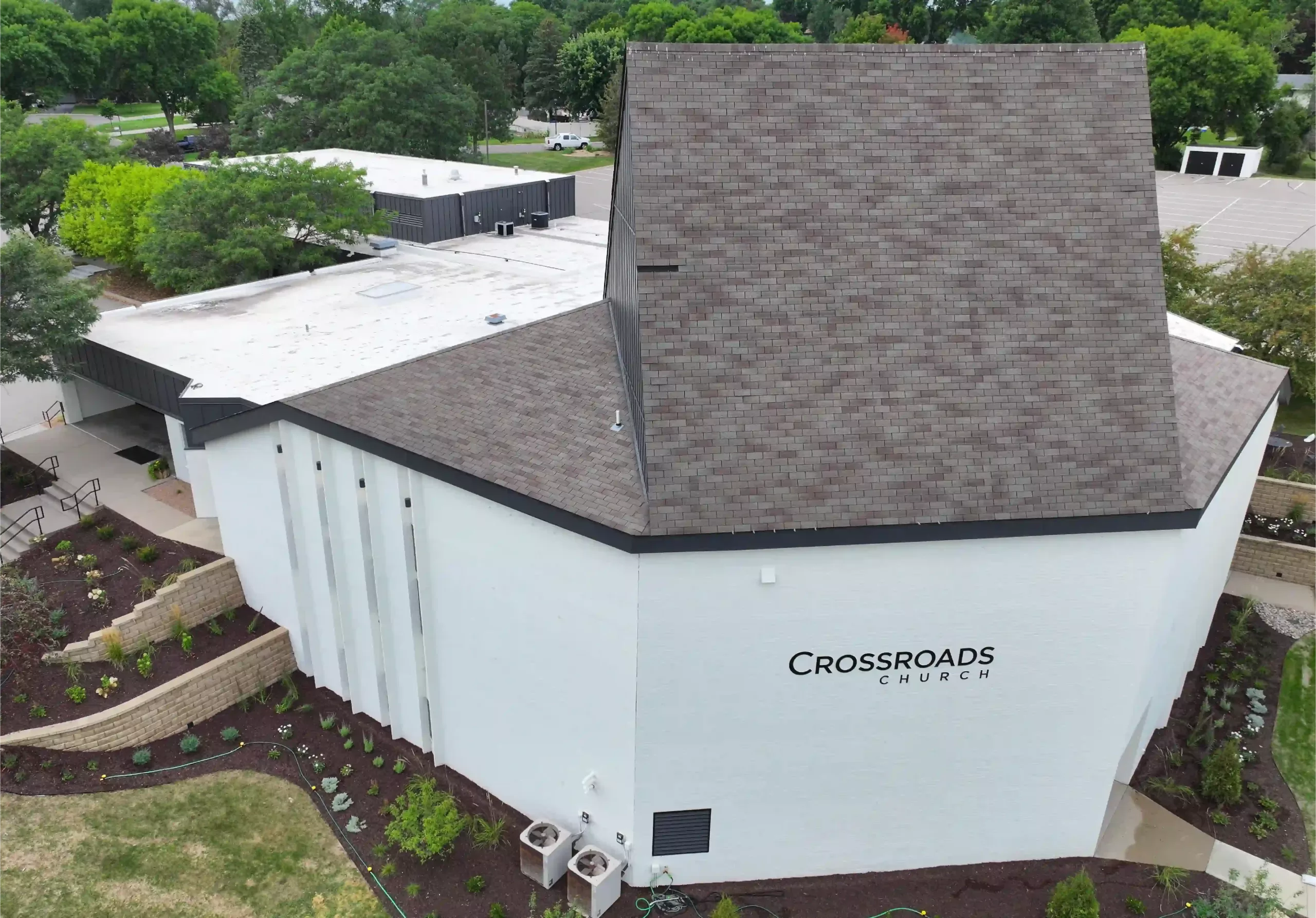 Crossroads Church with old roof in need of replacement